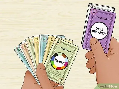 Играть в Monopoly Deal, шаг 12 Играть в Monopoly Deal, шаг 12