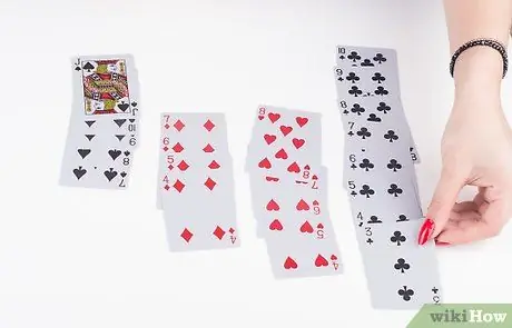 Играйте в карточную игру под названием «Семерки», шаг 4 Играйте в карточную игру под названием «Семерки», шаг 4