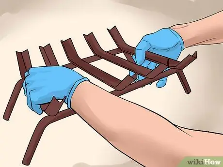 Установите газовые журналы Шаг 4