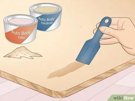 Отремонтируйте отверстия под винты в ДСП Шаг 2