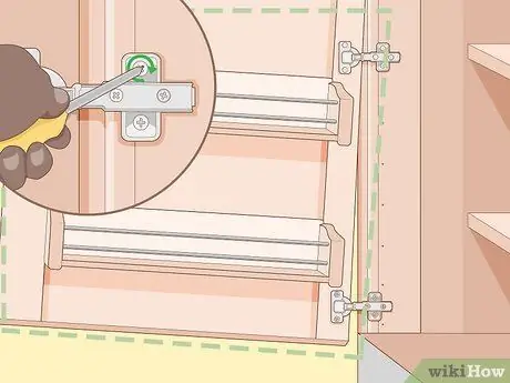 Отрегулируйте дверцы кухонного шкафа, шаг 7