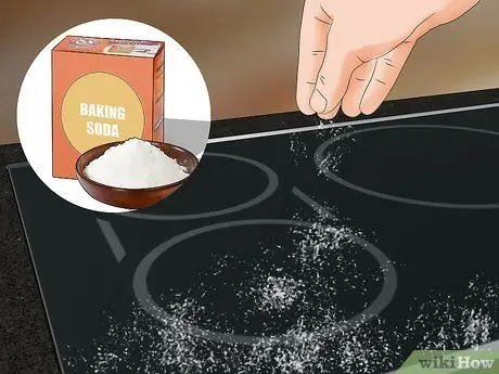 Очистите верхнюю часть керамической плиты Шаг 1