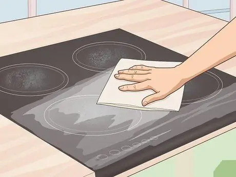 Очистите пригоревшую керамическую плиту Шаг 1