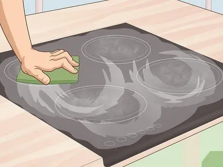 Очистите пригоревшую керамическую плиту Шаг 5