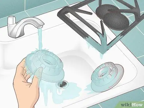 Держите газовую плиту в чистоте Шаг 10