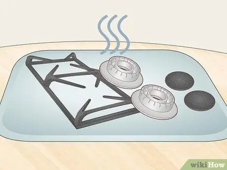 Держите газовую плиту в чистоте Шаг 11