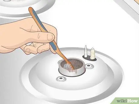 Держите газовую плиту в чистоте Шаг 6