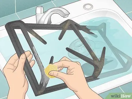 Держите газовую плиту в чистоте Шаг 8