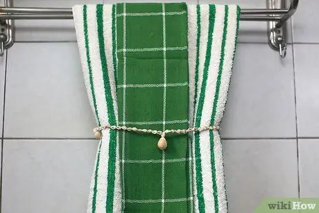 Сложите полотенца Шаг 9