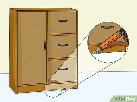 Закройте отверстие для мыши, шаг 6