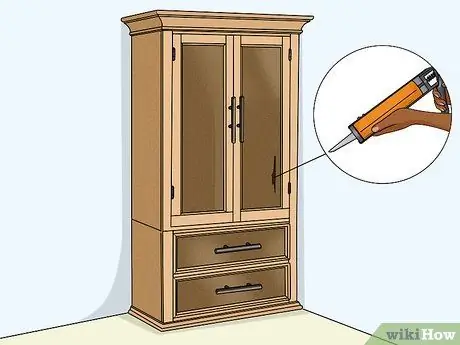 Закройте отверстие для мыши, шаг 8