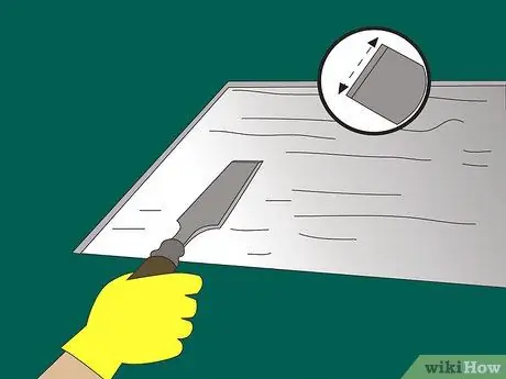 Удаление латексного резинового ковра и плиточного клея с цементного пола Шаг 5