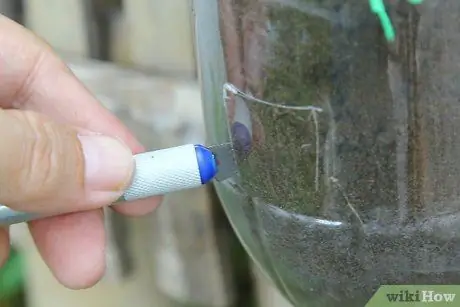 Создайте вертикальный сад из газированных бутылок Шаг 14