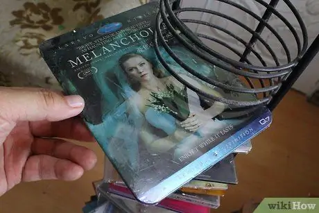 Храните DVD в небольшом пространстве Шаг 3