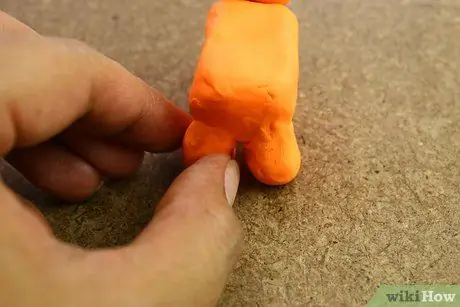 Сделайте стоящего тигра из глины. Шаг 12