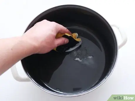 Очистите голландскую духовку Шаг 6