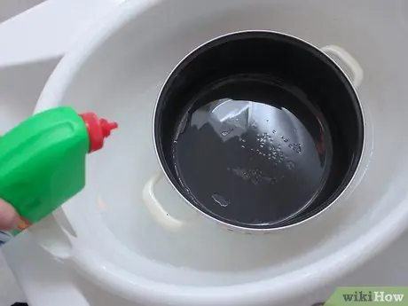 Очистите голландскую духовку Шаг 9