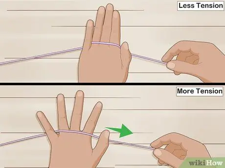 Удерживайте пряжу для вязания крючком Шаг 6