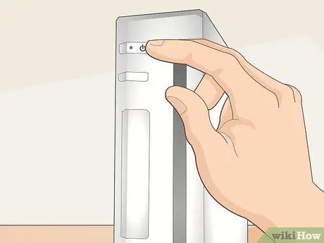 Синхронизируйте Wii Remote с консолью Шаг 1