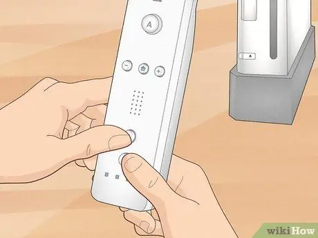 Синхронизируйте Wii Remote с консолью Шаг 10