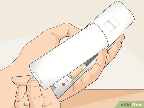 Синхронизируйте Wii Remote с консолью Шаг 3