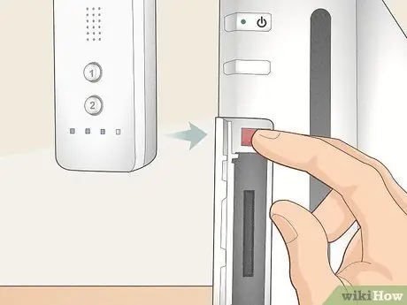 Синхронизируйте Wii Remote с консолью Шаг 5