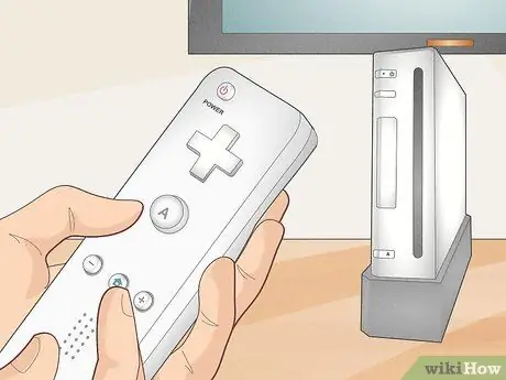 Синхронизируйте Wii Remote с консолью Шаг 7