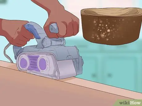 Отрегулируйте провисание двери Шаг 9