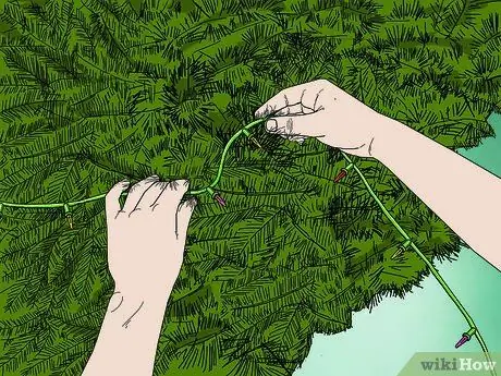 Украшаем елку лентой Шаг 4 Украшаем елку лентой Шаг 4