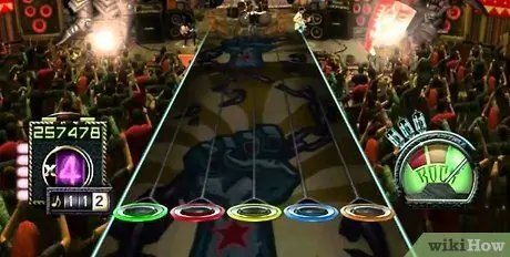 Улучшите свое мастерство в Guitar Hero I, II и III Шаг 2 Улучшите свое мастерство в Guitar Hero I, II и III Шаг 2