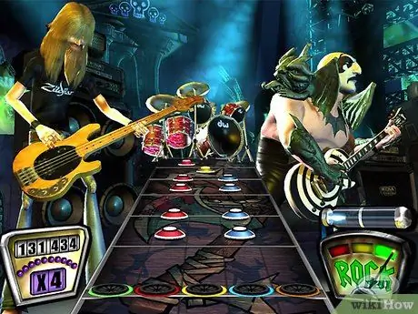 Играйте в Guitar Hero 2 с помощью обычного контроллера Шаг 1 Играйте в Guitar Hero 2 с помощью обычного контроллера Шаг 1