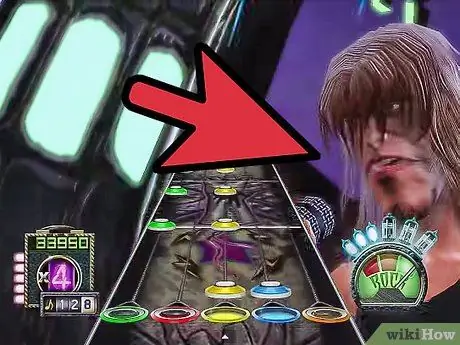 Двуручный удар по Guitar Hero Шаг 5 Двуручный удар по Guitar Hero Шаг 5