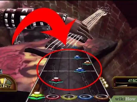 Играйте в Guitar Hero как профессионал Шаг 5 Играйте в Guitar Hero как профессионал Шаг 5