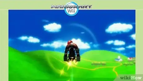 Уклоняйтесь от синей ракушки на Mario Kart Wii с помощью гриба-ускорителя. Шаг 5 Уклоняйтесь от синей ракушки на Mario Kart Wii с помощью гриба-ускорителя. Шаг 5