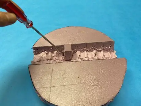 Remove_foam_chunks_with_screwdriver Remove_foam_chunks_with_screwdriver